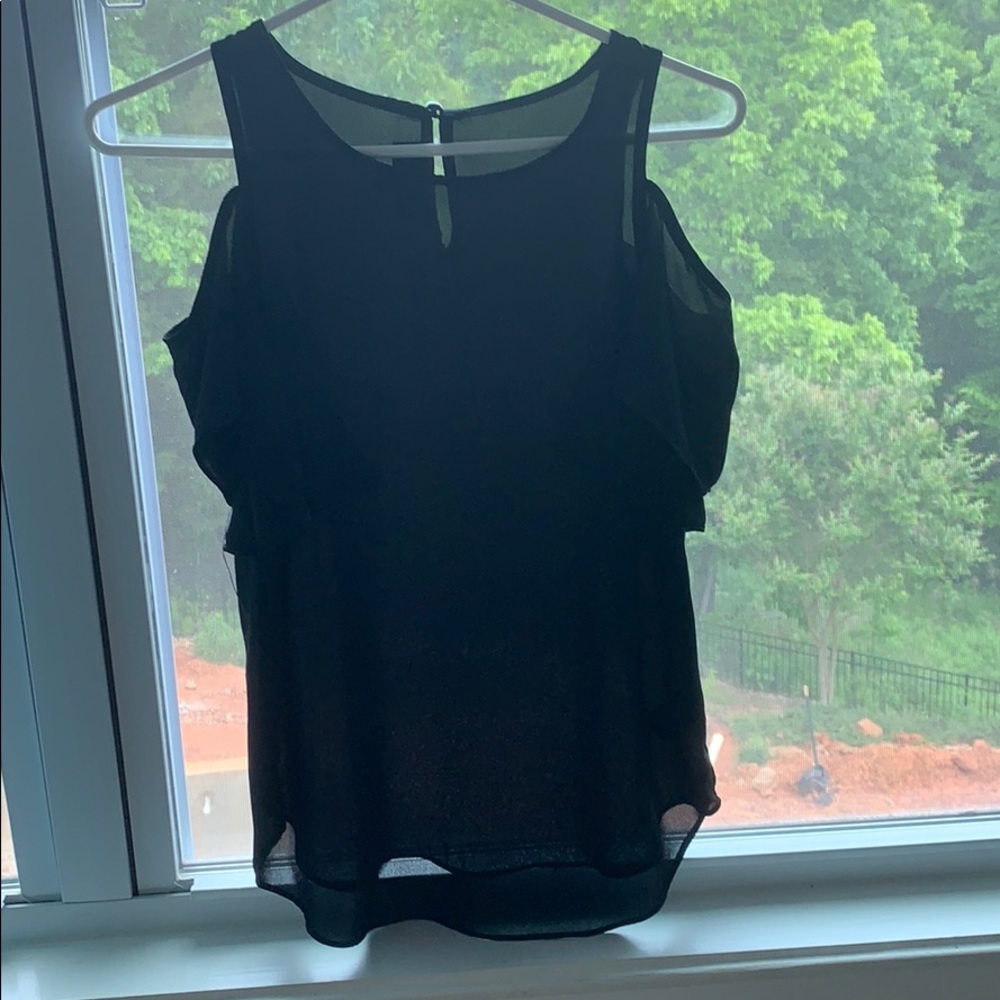 black flowy sleeve off the shoulder shirt